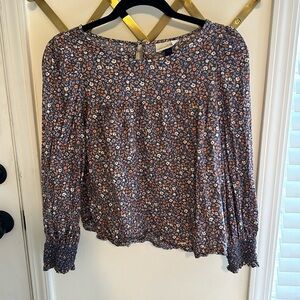 Purple floral long sleeve blouse with ruched sleeves